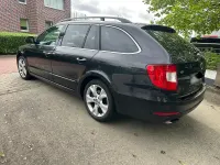 Gebraucht Skoda Superb 160 PS (117 kW) 2011 Schwarz Kombi