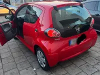 Gebraucht Toyota Aygo 68 PS (50 kW) 2009 Rot Kleinwagen