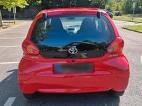 Gebraucht Toyota Aygo 68 PS (50 kW) 2009 Rot Kleinwagen