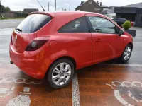Gebraucht Opel Corsa Edition 86 PS (63 kW) 2012 Rot Kleinwagen