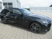 Gebraucht BMW 320e M Sport 204 PS (150 kW) 2023 Schwarz Kombi