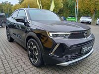 Gebraucht Opel Mokka-e Ultimate 100 kW (136 PS) 2022 Karbon schwarz metallic SUV