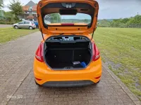 Gebraucht Ford Fiesta Titanium 95 PS (69 kW) 2011 Orange Limousine