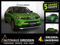 Gebraucht Opel Mokka-e Elegance 100 kW (136 PS) 2022 Matcha green (metallic) SUV