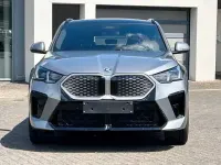 Gebraucht BMW iX2 M Sport 279 kW (380 PS) 2025 Skyscraper grau metallic SUV