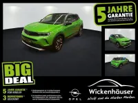 Gebraucht Opel Mokka Elegance 101 PS (74 kW) 2022 Matcha green/ikone gruen (metallic) SUV
