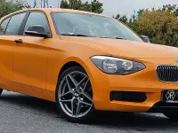 Gebraucht BMW 116 Sport Line 136 PS (100 kW) 2013 Orange Kleinwagen