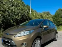 Gebraucht Ford Fiesta Titanium 82 PS (60 kW) 2012 Braun Kleinwagen