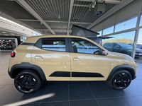 Gebraucht Dacia Spring Extreme 47 kW (65 PS) 2023 Safaribeige Kleinwagen