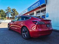 Käytetty Tesla Model 3 Standard Range Plus 225 kW (306 HP) 2021 Punainen Sedan