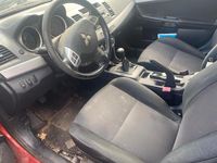 Gebraucht Mitsubishi Lancer 143 PS (105 kW) 2009 Rot Limousine