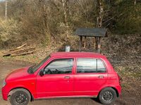 Gebraucht Daihatsu Cuore 56 PS (41 kW) 2002 Rot Kleinwagen