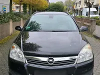 Second-hand Opel Astra 125 CP (91 kW) 2008 Negru Break