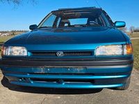 Gebraucht Mazda 323 88 PS (64 kW) 1993 Grün Kleinwagen