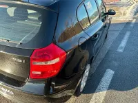 Gebraucht BMW 116 122 PS (89 kW) 2009 Schwarz Kleinwagen