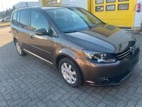 Gebraucht VW Touran Life 106 PS (77 kW) 2014 Braun Van / Kleinbus
