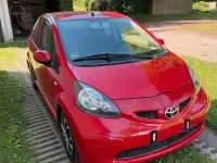 Gebraucht Toyota Aygo 68 PS (50 kW) 2008 Rot Kleinwagen