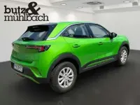 Gebraucht Opel Mokka-e 100 kW (136 PS) 2021 Matcha green (metallic) SUV