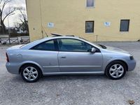 Second-hand Opel Astra 147 CP (108 kW) 2000 Argintiu Coupe