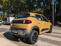 Gebraucht Dacia Spring Extreme 47 kW (65 PS) 2025 Safaribeige Kleinwagen