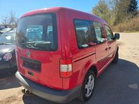 Second-hand VW Caddy 80 CP (58 kW) 2009 Roșu Monovolum