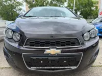 Usado Chevrolet Aveo LT 101 HP (74 kW) 2013 Castanho Citadino