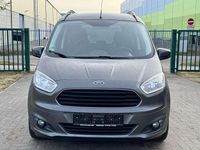 Gebraucht Ford Tourneo Courier Titanium 101 PS (74 kW) 2017 Magneticgrau (metallic) Van / Kleinbus