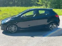 Gebraucht Mazda 2 Inclusive 86 PS (63 kW) 2009 Schwarz Kleinwagen