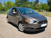 Gebraucht Mitsubishi Colt 75 PS (55 kW) 2012 Braun Kleinwagen
