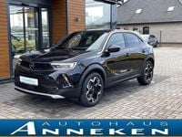 Gebraucht Opel Mokka-e Ultimate 100 kW (136 PS) 2023 Diamant schwarz/karbon schwarz SUV