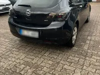 Używany Opel Astra 110 KM (80 kW) 2010 Czarny Sedan/Limuzyna