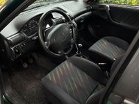 Gebraucht Opel Astra 75 PS (55 kW) 1998 Grün Kombi