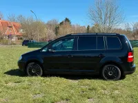 Używany VW Touran 120 KM (88 kW) 2006 Czarny Minivan