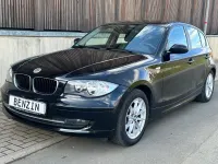 Usata BMW 116 122 CV (89 kW) 2009 Nero Utilitaria