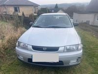 Gebraucht Mazda 323 88 PS (64 kW) 1998 Silber Limousine