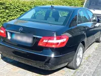 Second-hand Mercedes E200 184 CP (135 kW) 2009 Negru Berlinǎ