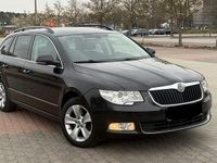 Second-hand Skoda Superb 140 CP (102 kW) 2012 Negru Break