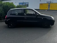 Używany Renault Clio II Authentique 58 KM (42 kW) 2004 Czarny Sedan/Limuzyna