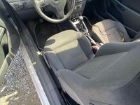 Używany Opel Astra Basis 90 KM (66 kW) 2006 Srebrny Coupe