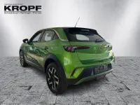 Gebraucht Opel Mokka Elegance 101 PS (74 kW) 2024 Lackierung matcha green/typ au SUV