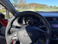 Second-hand Kia Rio 86 CP (63 kW) 2012 Roșu Hatchback