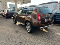 Używany Dacia Duster Prestige 105 KM (77 kW) 2012 Brązowy Minivan