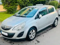 Usado Opel Corsa 101 HP (74 kW) 2013 Prateado Citadino