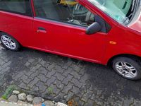 Gebraucht Daihatsu Cuore 58 PS (42 kW) 2006 Rot Kleinwagen