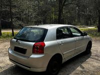 Używany Toyota Corolla 110 KM (80 kW) 2006 Srebrny Sedan/Limuzyna