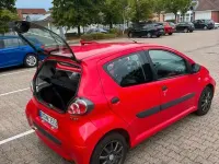 Gebraucht Toyota Aygo 68 PS (50 kW) 2009 Rot Kleinwagen