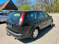 Używany Ford Focus 110 KM (80 kW) 2006 Czarny Kombi