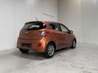 Gebraucht Hyundai i10 67 PS (49 kW) 2015 Orange Kleinwagen
