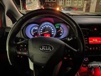 Second-hand Kia Rio 86 CP (63 kW) 2013 Roșu Hatchback