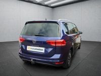 Second-hand VW Touran 150 CP (110 kW) 2023 Albastru Monovolum